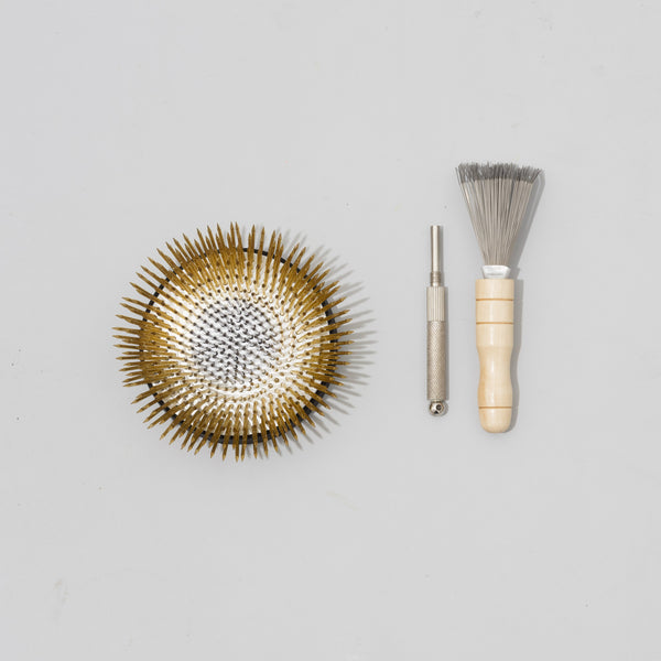 Lotus kenzan with care kit.